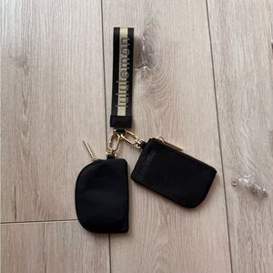 Lululemon Black and Gold Wristlet Set